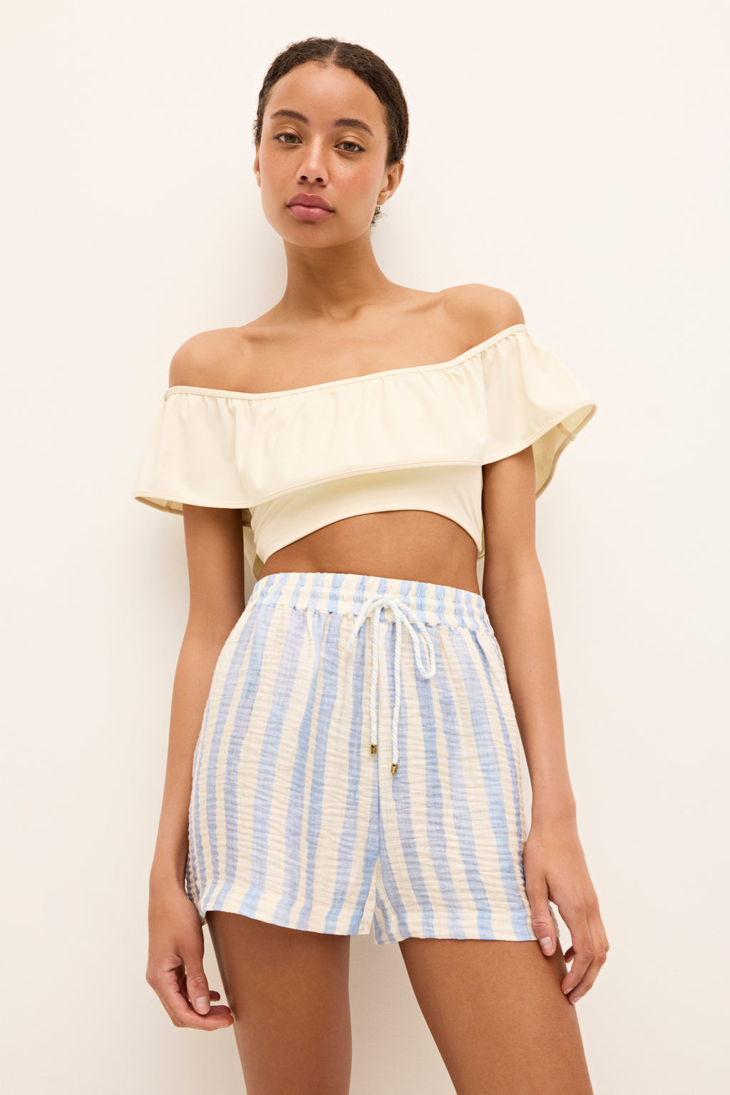 High waisted blue and white vertical striped shorts with drawstring waist