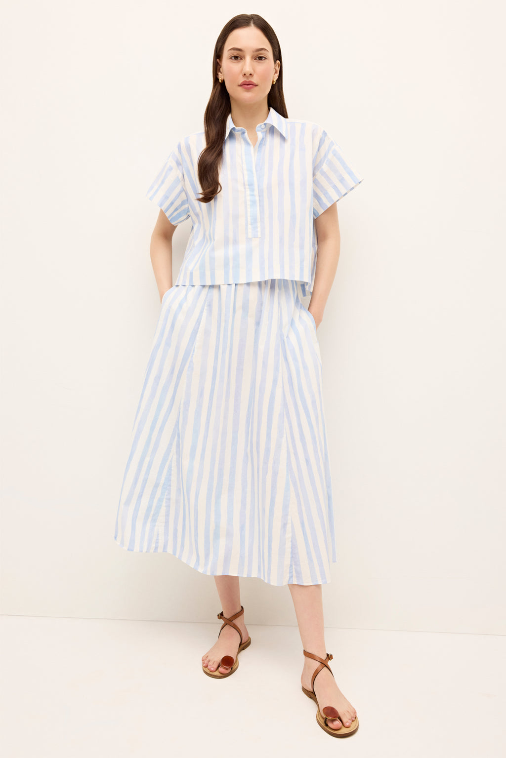 Short sleeve top with blue and white vertical stripes