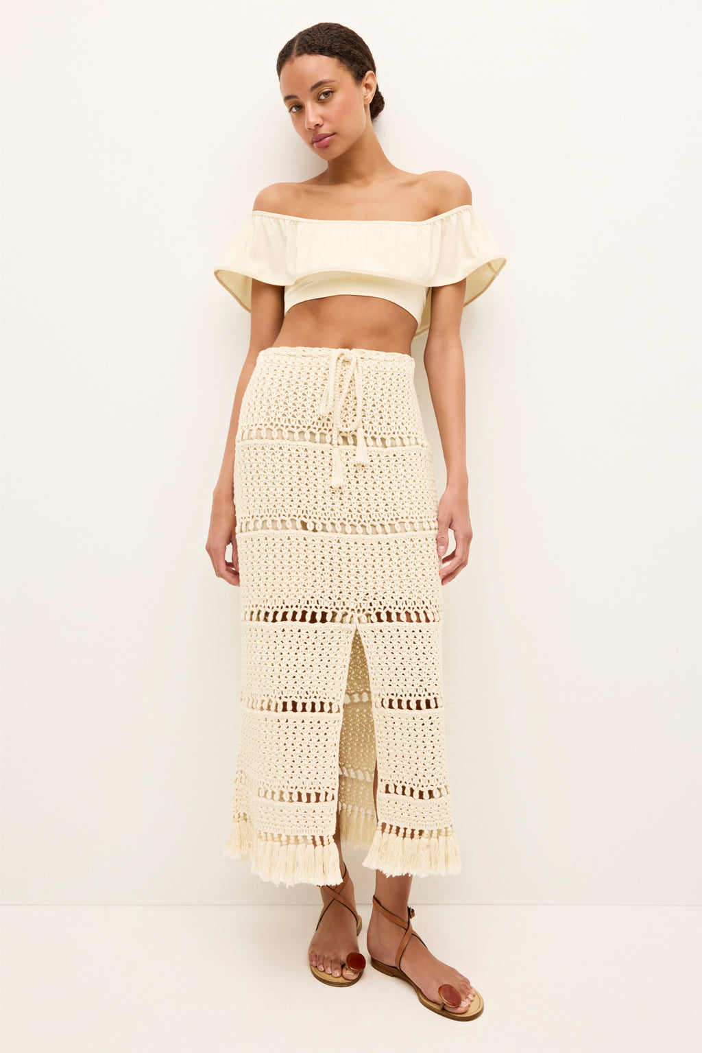 Boho style off white skirt with horizontal openwork stripes and a drawstring waist