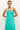 Sleeveless tiered dress in teal with keyhole front and crossover halter straps