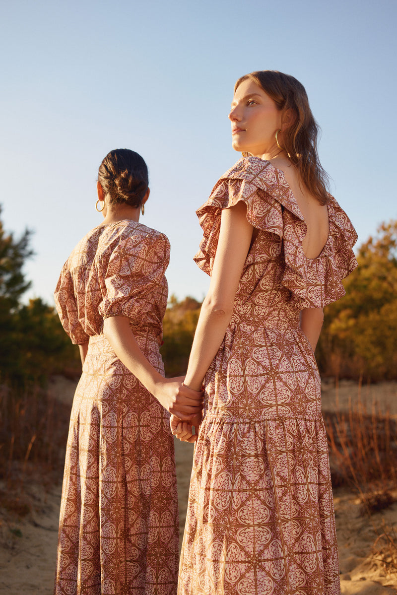 Puff sleeve top in a pink and brown mosaic tile print
