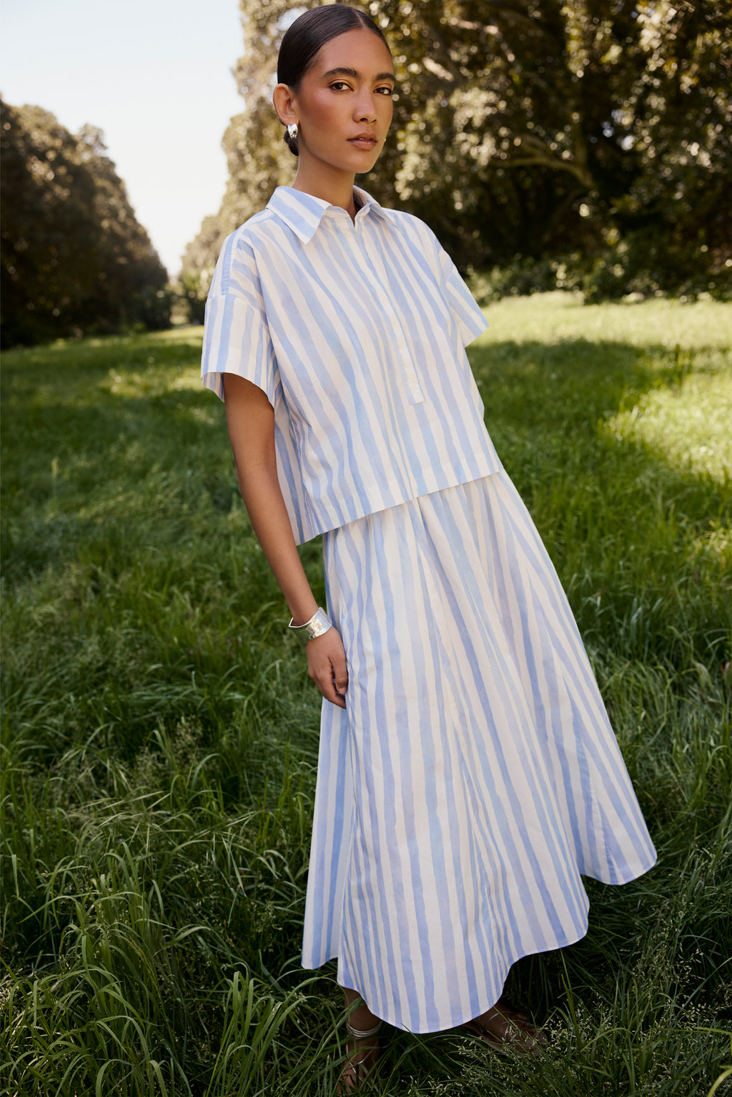 A-line midi skirt with watercolor blue and white vertical stripes 