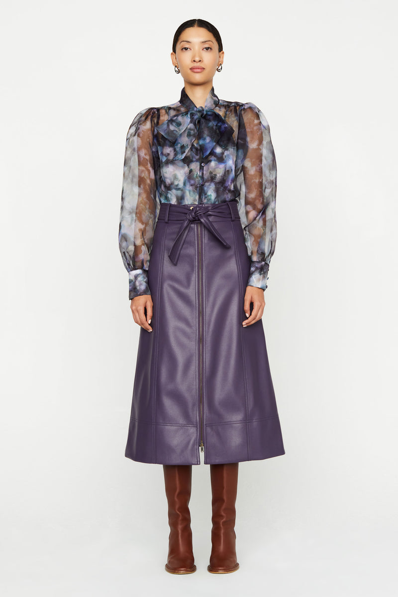 Long sleeve blouse with sheer printed overlay and self sash neck tie 