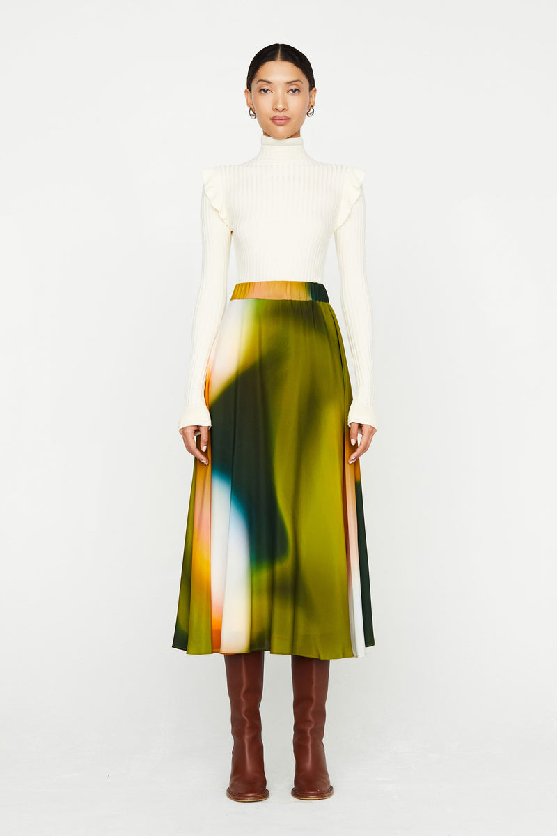 Midi length skirt with orange, green, and pink design 