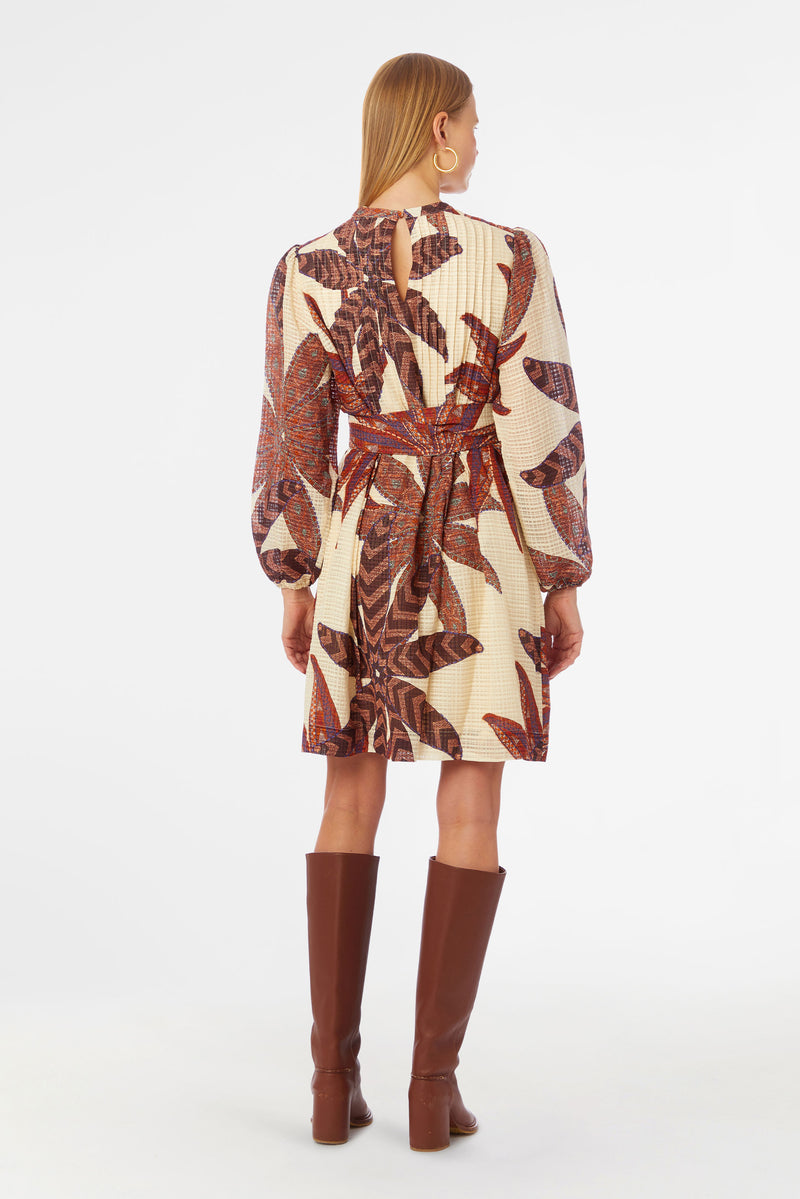 High neck, long sleeve dress with pintuck details on the bodice in a geometric brown floral