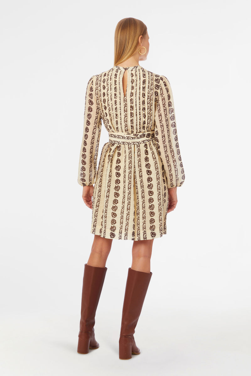 Long sleeve short dress with rounded neckline and optional belt at the waist