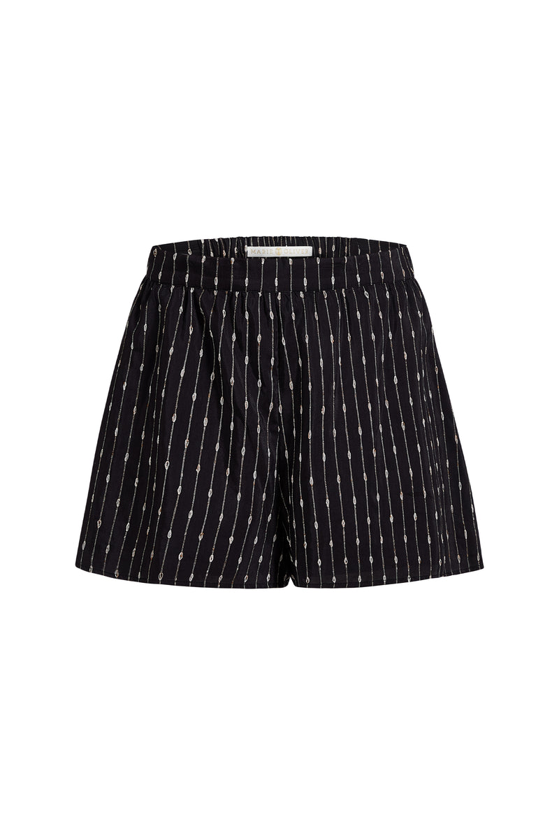 Elastic waist black shorts with white patterned lines and comfortable drape 