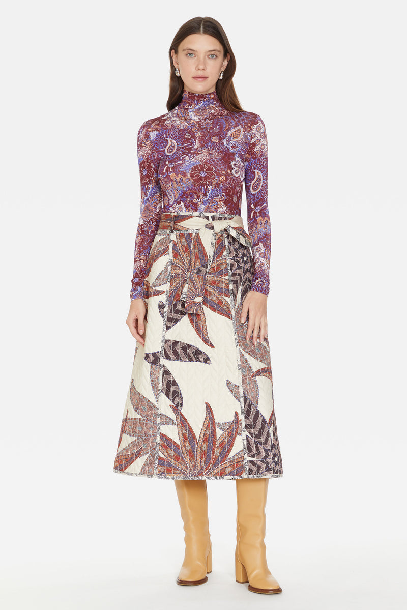 Midi length skirt with purple tone patterns and tie belt 