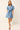 Denim mini dress with puff sleeves and a tie neck