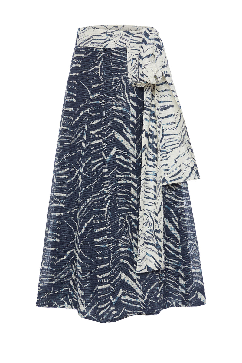 Traditional wrap skirt with long tie belt at the waist in a wavy multi-colored print