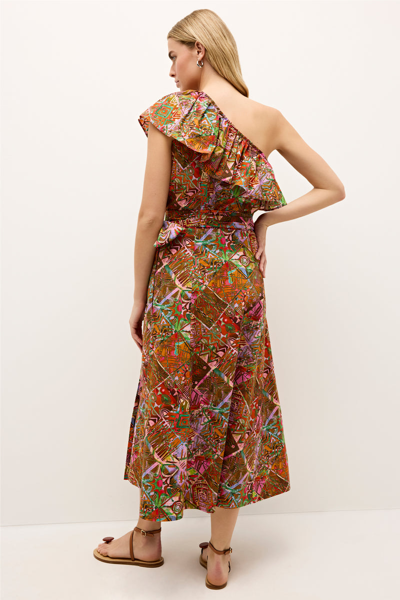 Mid length printed skirt with intricate patterns in orange, green, and pink hues 
