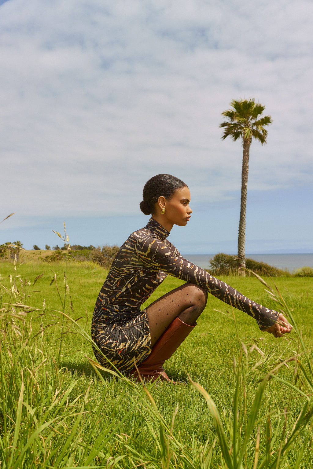 Zebra printed form fitting long sleeve turtle neck top