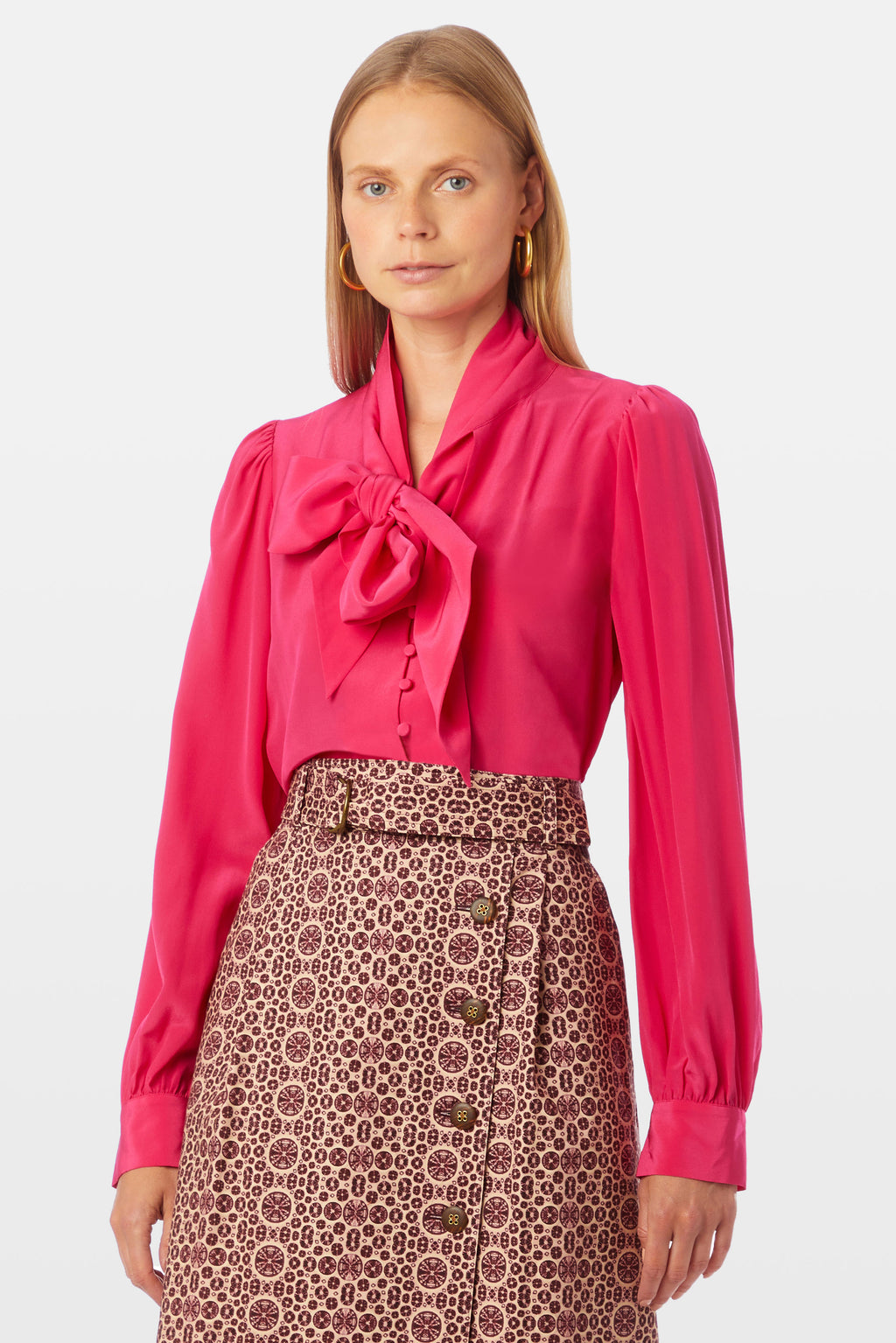 Pink button closure top with oversized bow