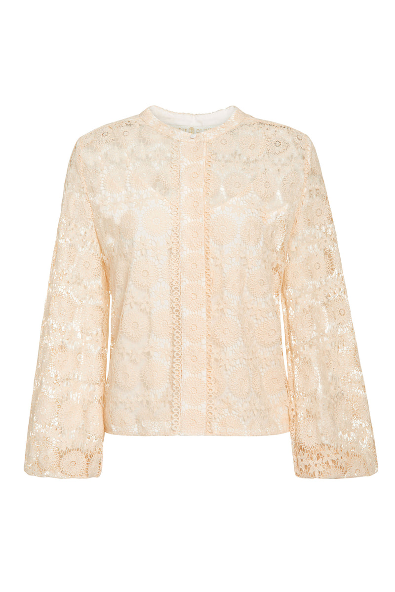 Blouse that has buttons down the front and long sleeves