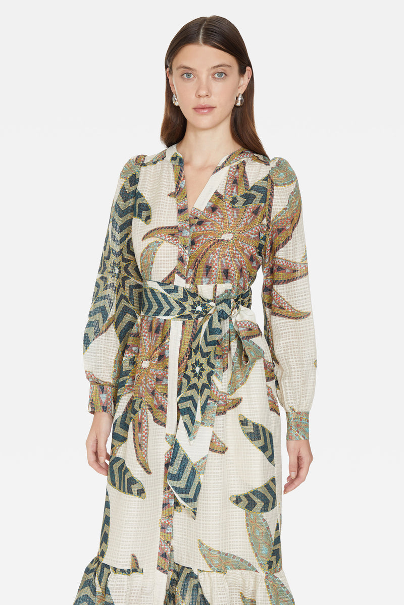 Long sleeve, midi dress with optional tie belt, v-neckline and side seam pockets in a green oversized floral print