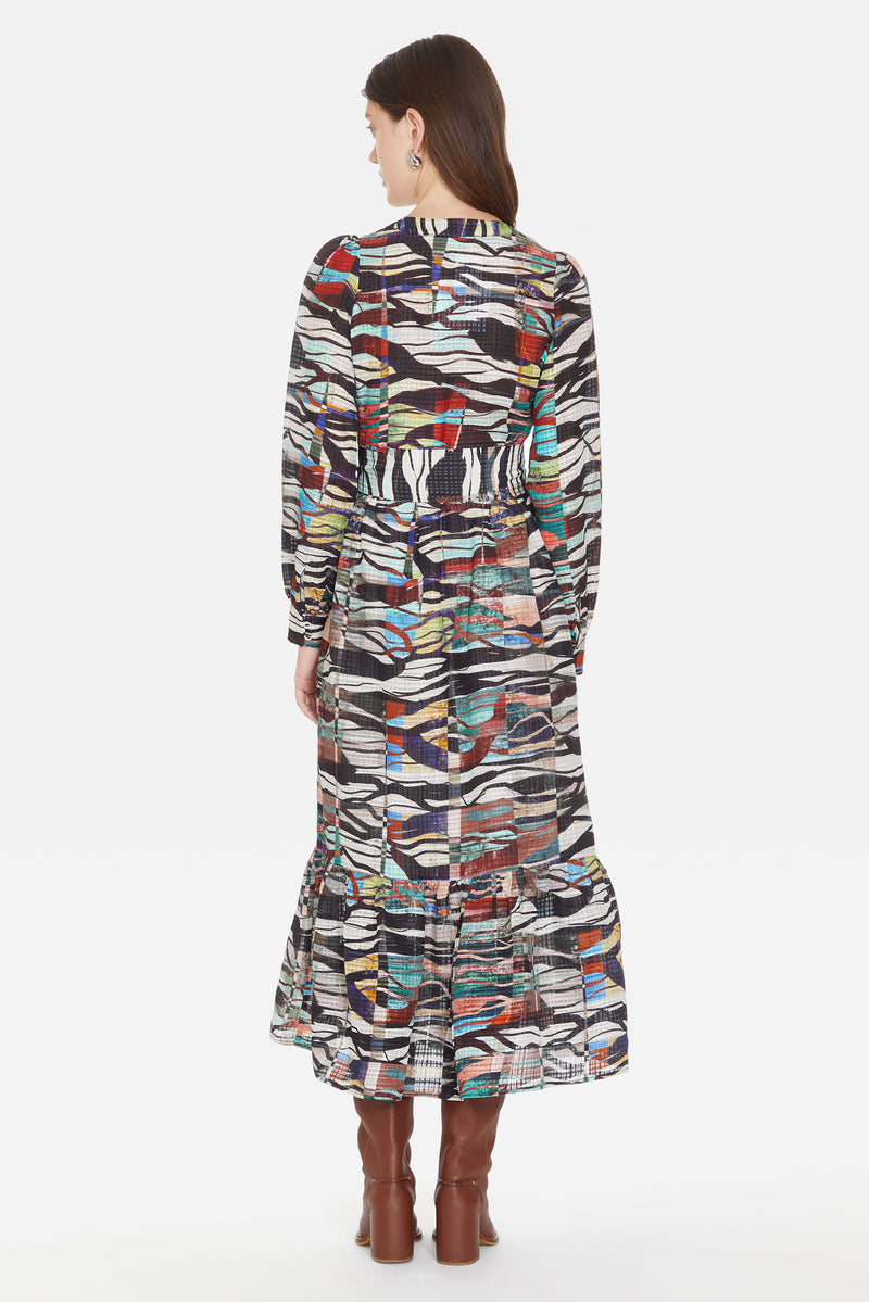 Multicolored abstract printed maxi dress with buttons down the front and long sleeves