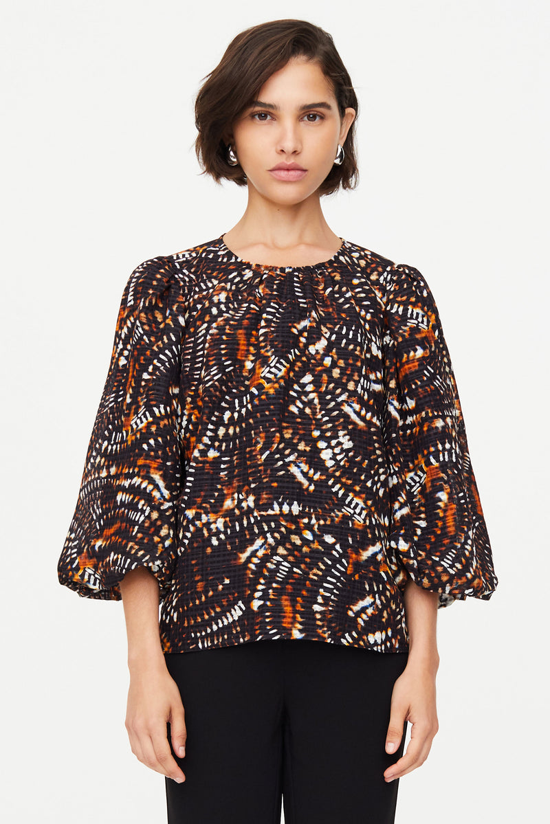 Crew neck three quarter length sleeves with puffed sleeves 