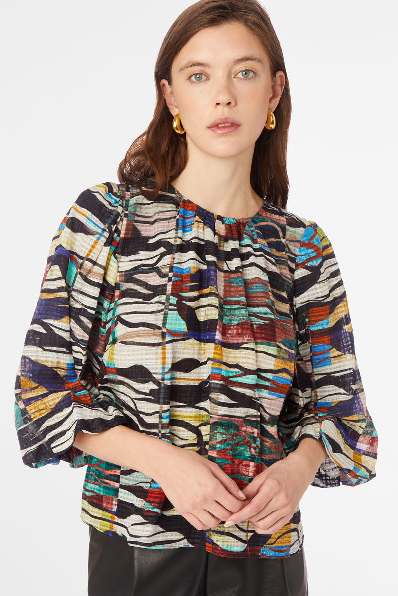 Relaxed fit, crew neck top with puff shoulder and three-quarter length sleeves and gather detail at the neckline