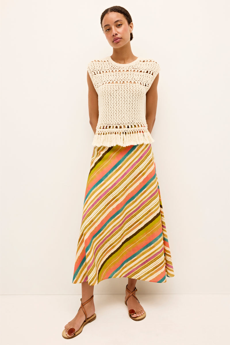 Striped skirt with an asymmetrical pattern in mustard, teal, and coral 