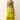 Bright yellow tiered maxi skirt with a colorful one shoulder top 