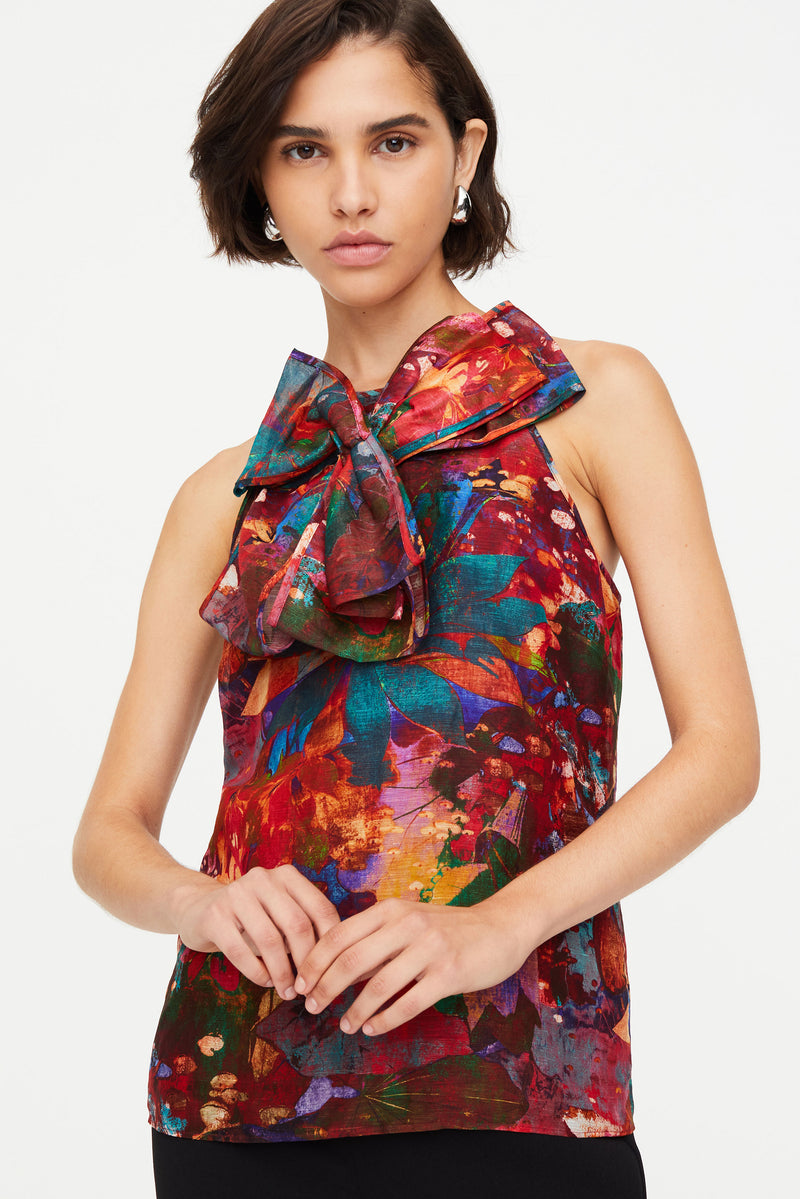Top with invisible zipper and bow 