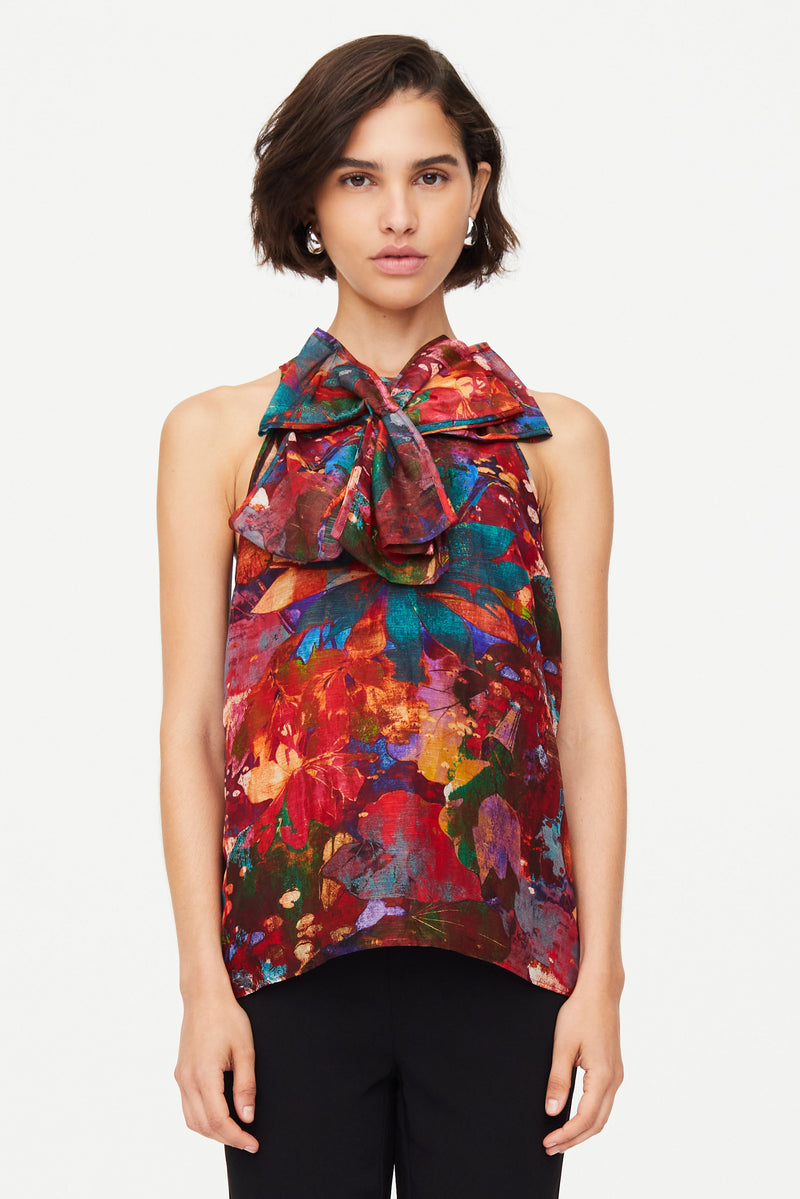 Top with invisible zipper and bow 