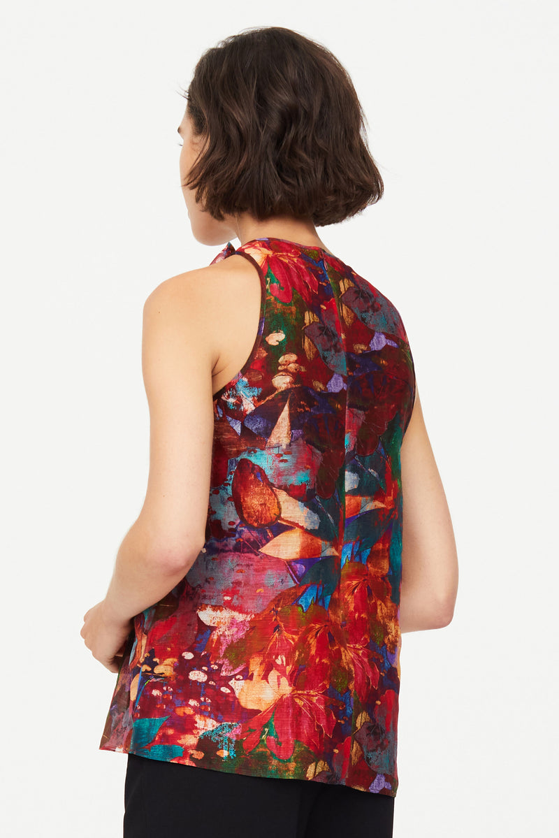 Sleeveless high neck top with a bow