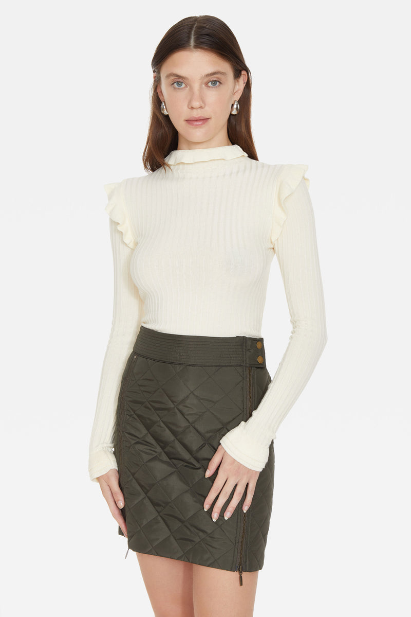 Quilted patterned mini skirt with zipper slit 