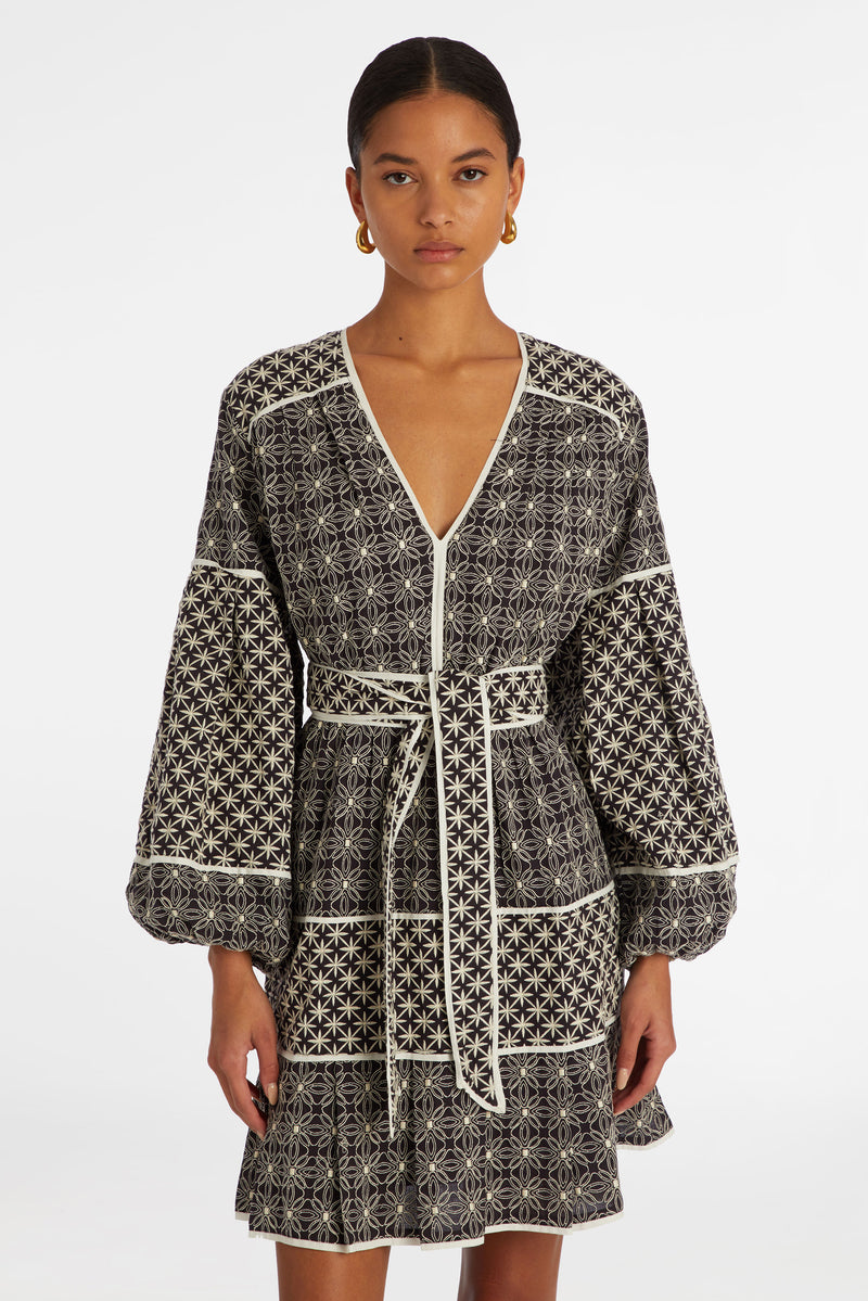 Black textured material mini dress with large long sleeves 