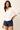 Slightly cropped white button down