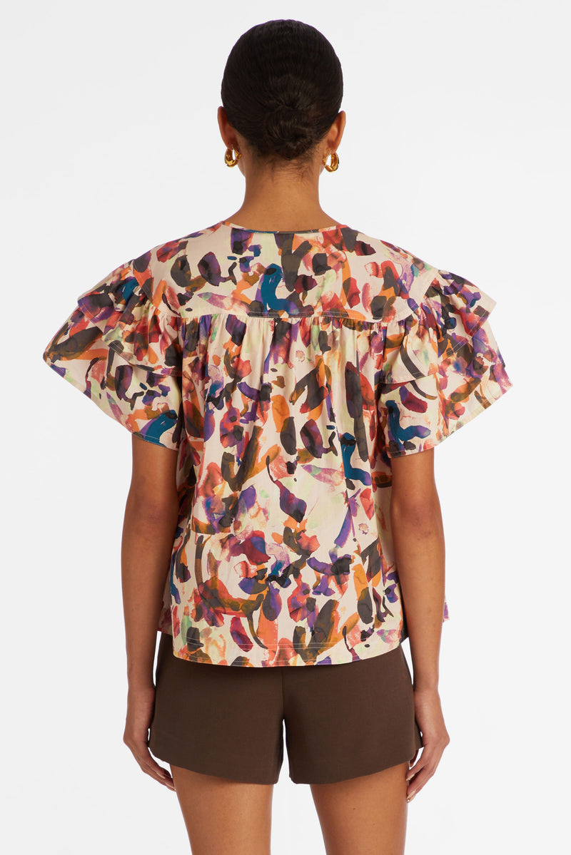 Short sleeve top with two tiered flutter sleeves