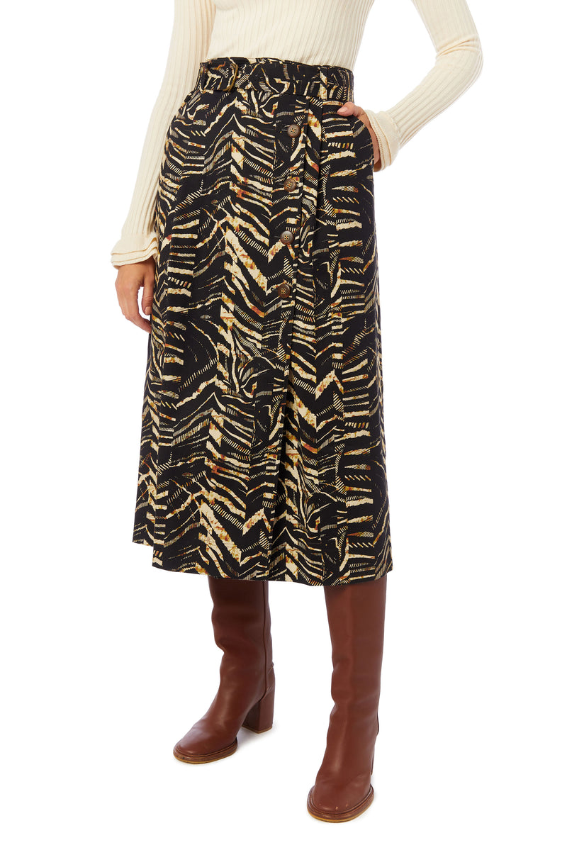 Lined, belted column skirt with slash pockets and topstitch details in zebra print