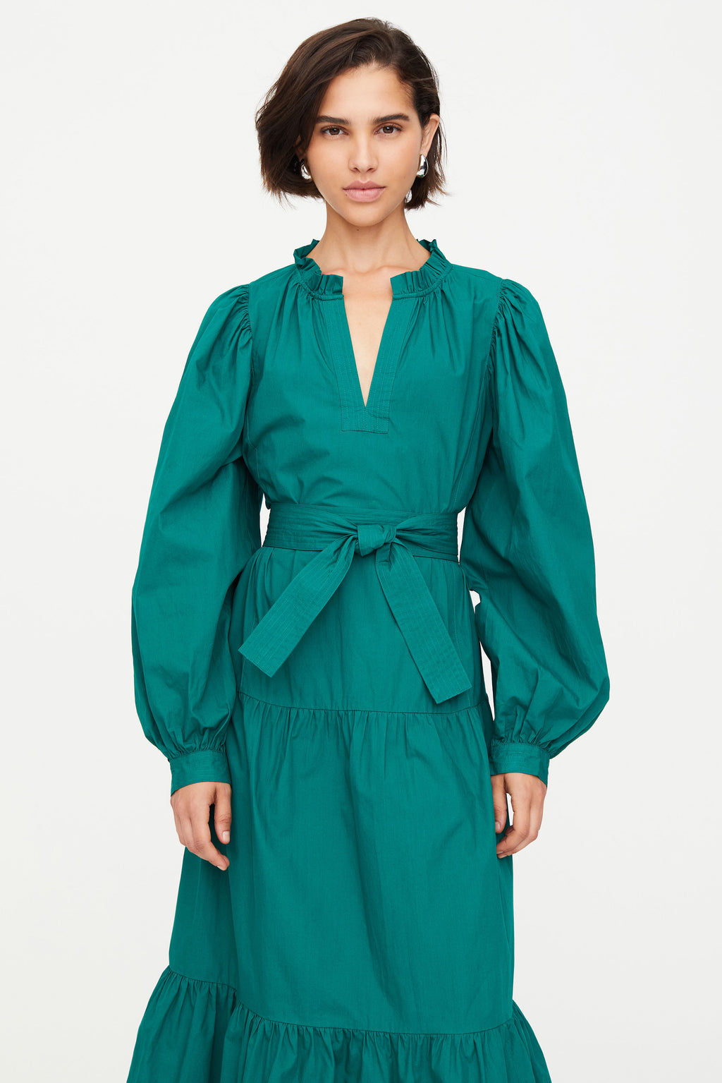 Solid green midi dress with v neckline and long sleeves 