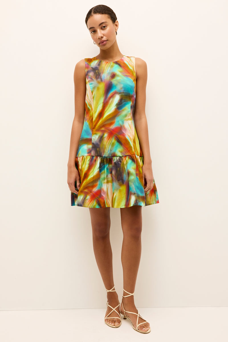 Boldly printed A-line mini dress with round neckline and drop waist silhouette 