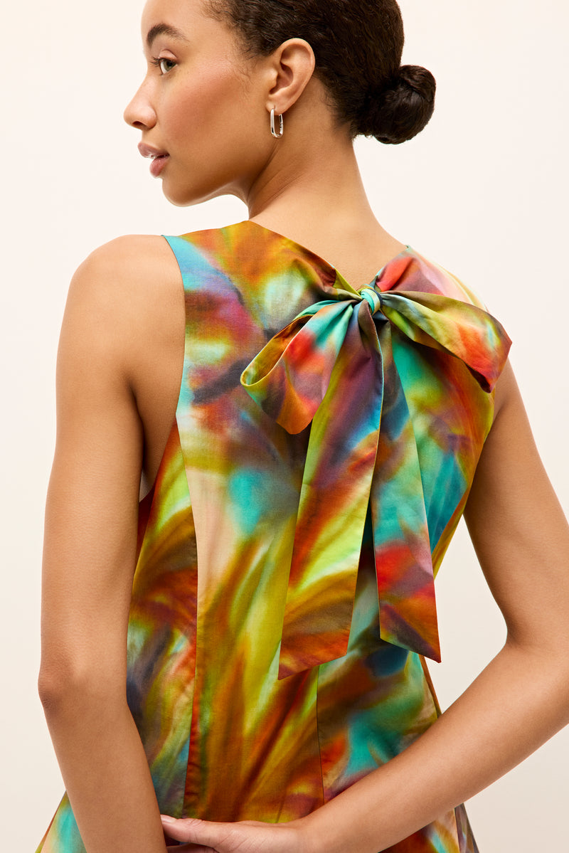 Fit-and-flaire sleeveless dress featuring a vibrant watercolor inspired design 