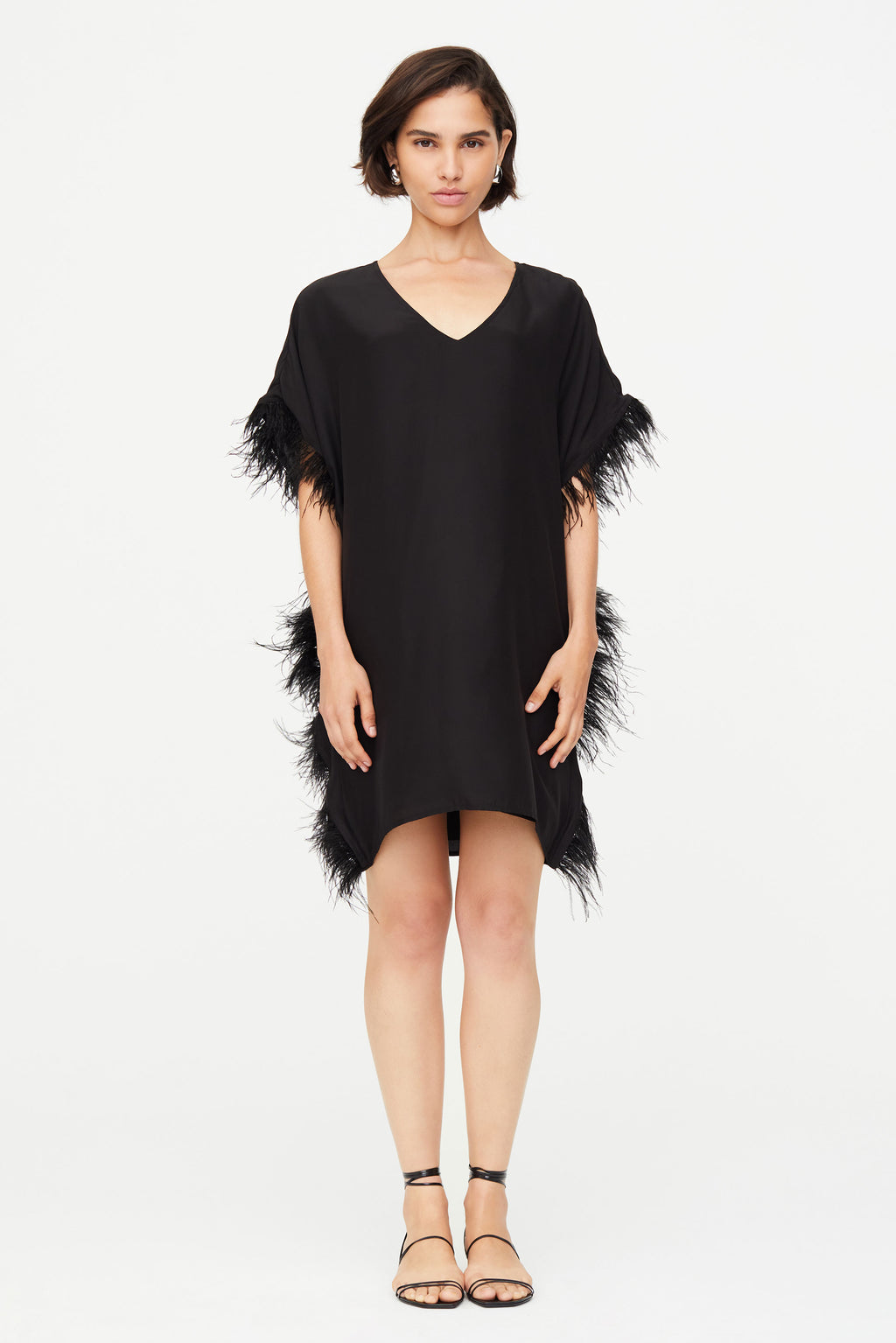 Short length dress with feather trim 