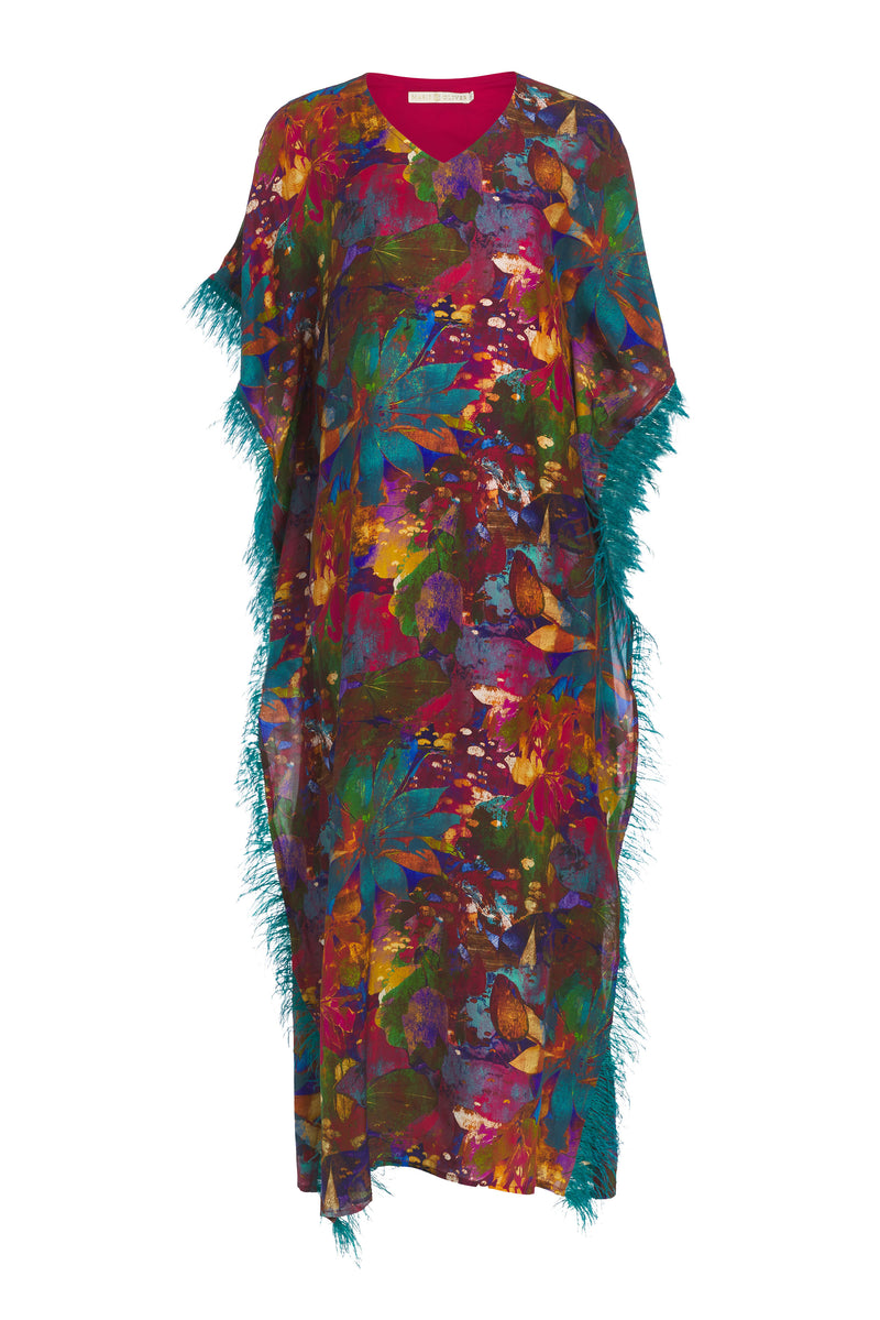 Long v-neck caftan with feather trim down the side in a bold print