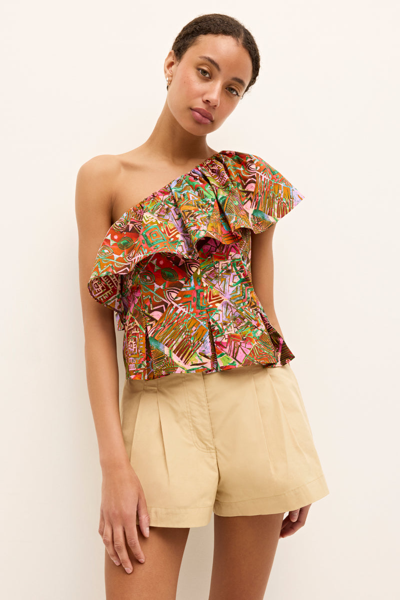 One shoulder top with vibrant tribal inspired print and ruffled neckline 