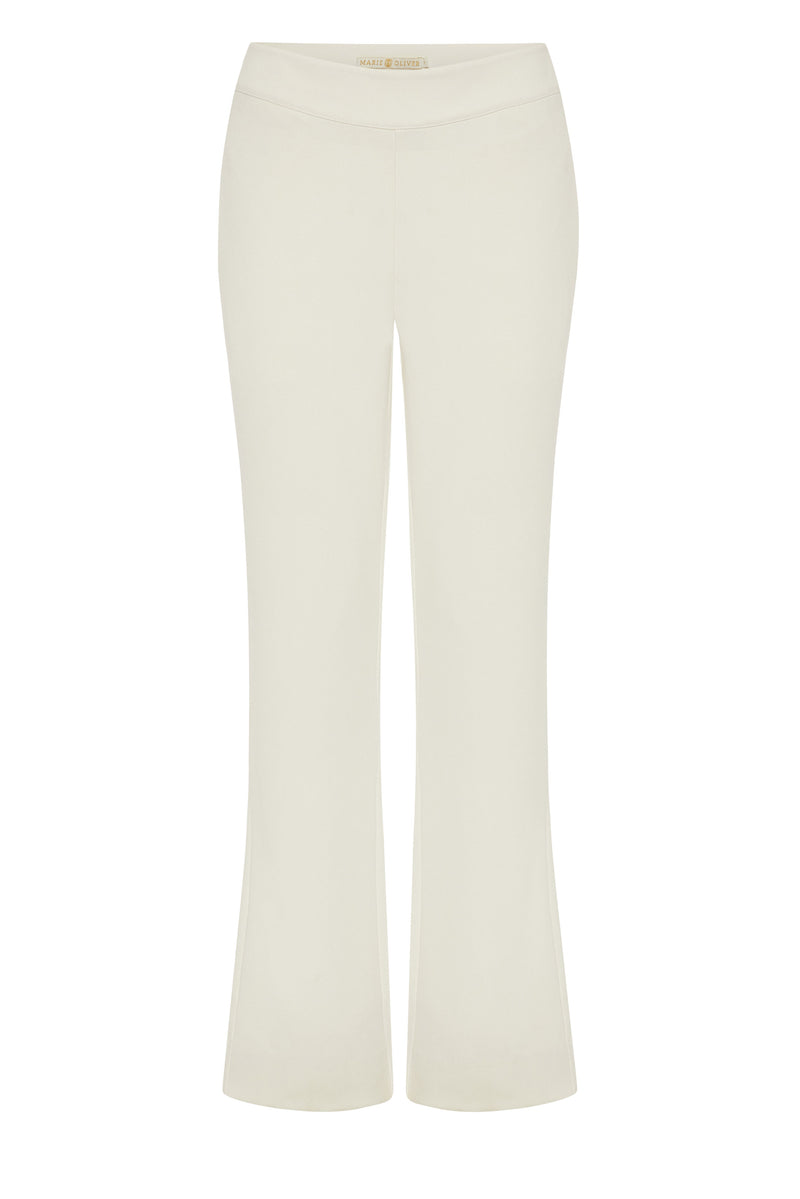 Slim fitting pants in a solid off white color