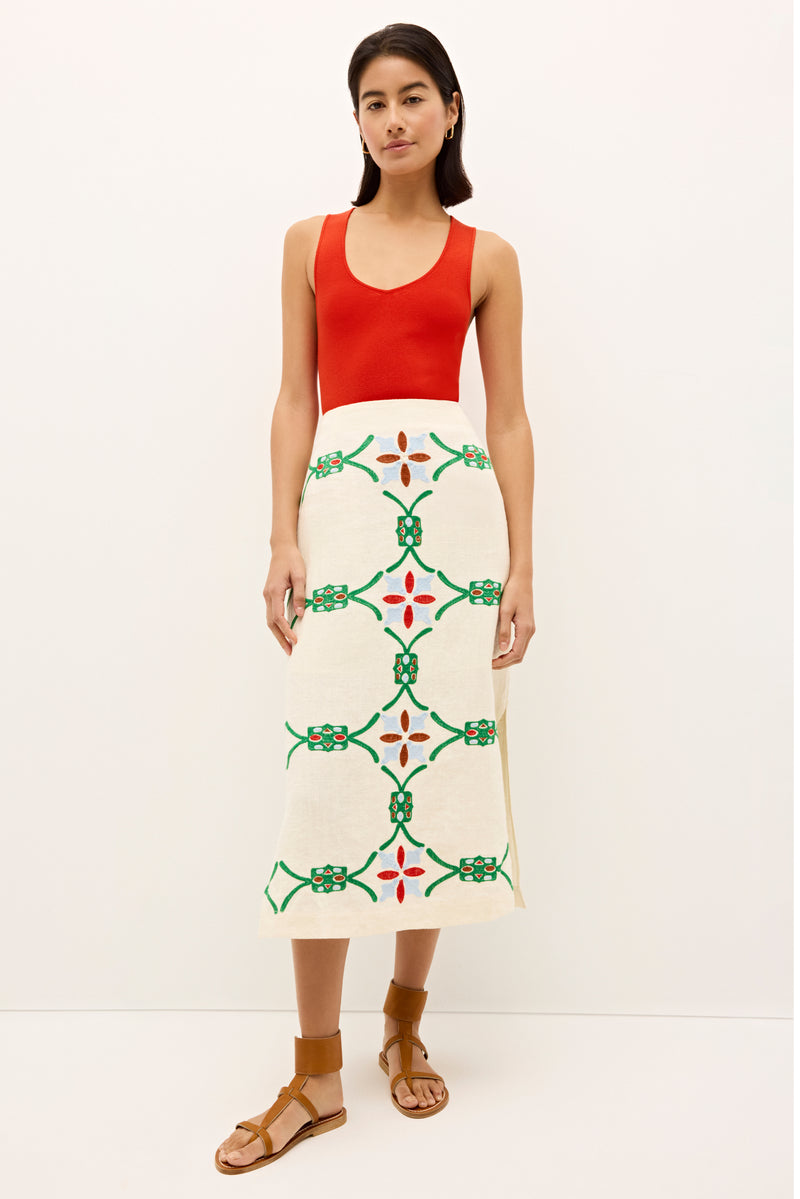 High waisted cream skirt with bold embroidery in a garden trellis design