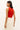 Form fitting red sleeveless top made from lightweight ribbed knit fabric