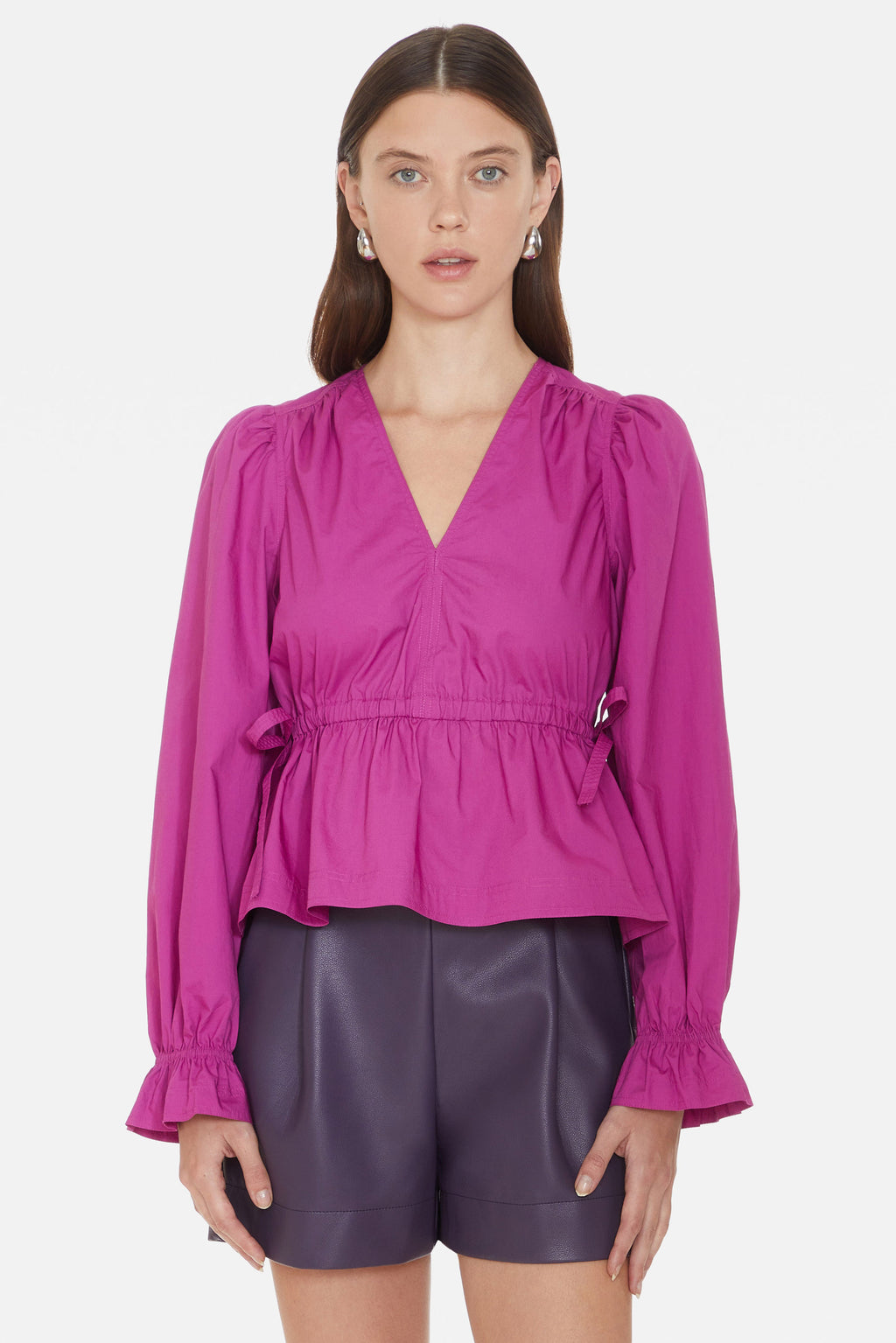 Long sleeve v-neck top with drawstring tied waist and elastic cuffs