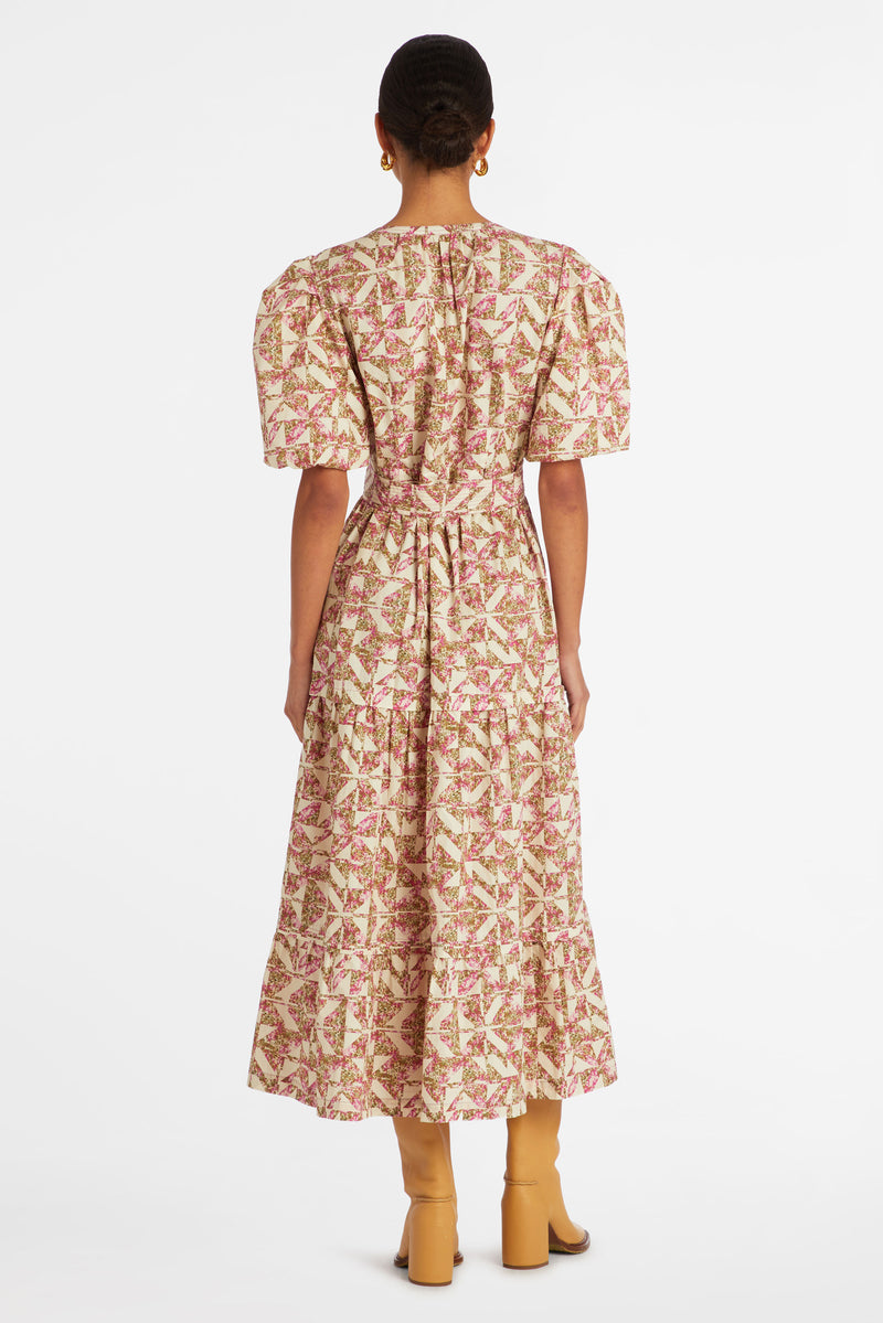 Long dress that is cinched at the waist with an optional belt