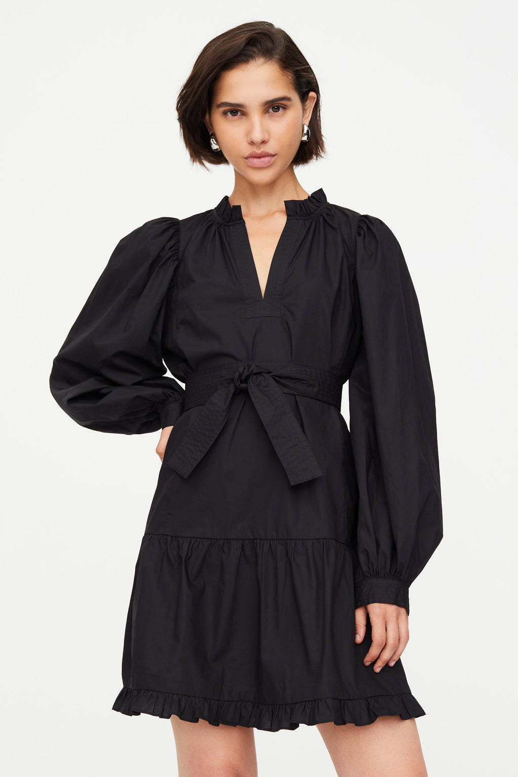 Solid black above the knee dress with long sleeves and v neckline 