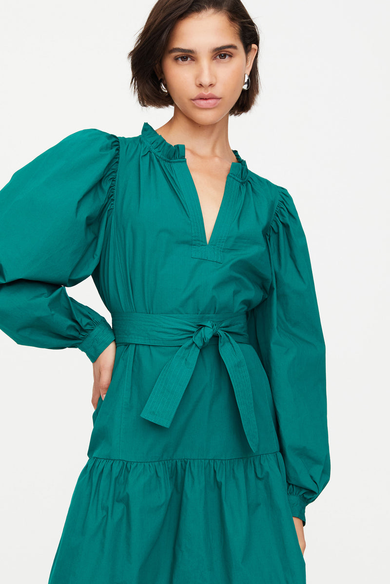 Solid green above the knee dress with long sleeves and v neckline 