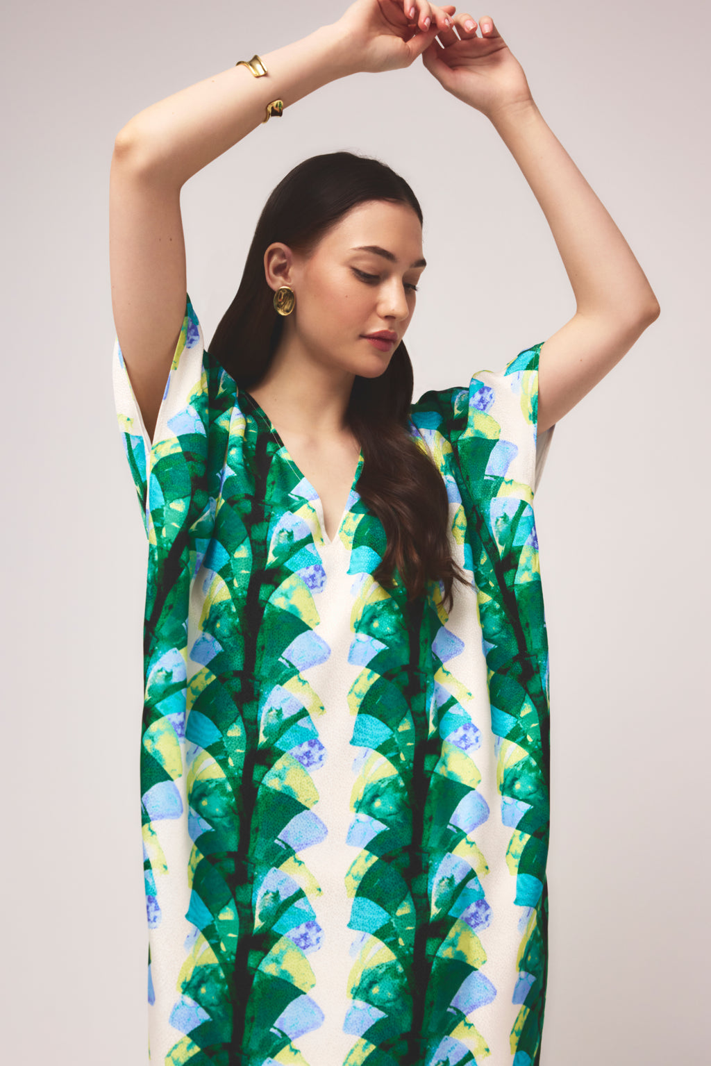 Relaxed fit caftan with a nature inspired pattern in cool tones 