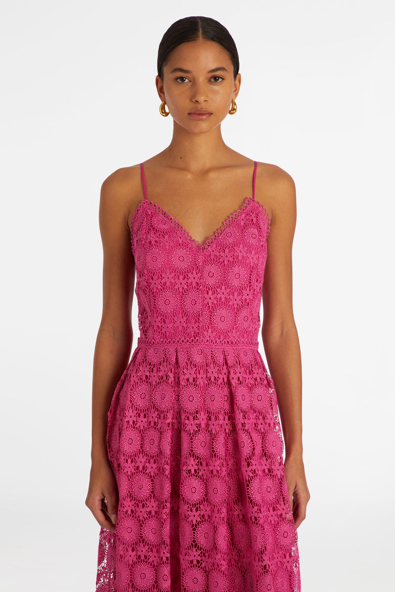 Bright pink lace dress with spaghetti straps and v-neckline