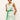 White and green a line dress with a wrap style bodice and tiered skirt 