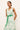 White and green a line dress with a wrap style bodice and tiered skirt