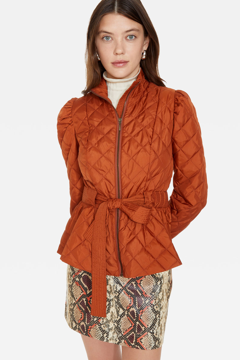 Ginger colored quilted jacket with zipper and stand up collar 